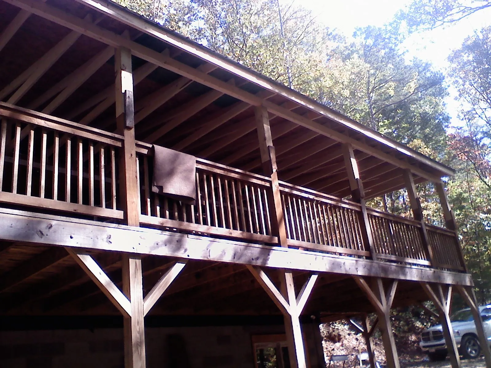 Timber framing under a new elevated porch and deck — Roof Leak Repair in East New Market by Roofing Brothers